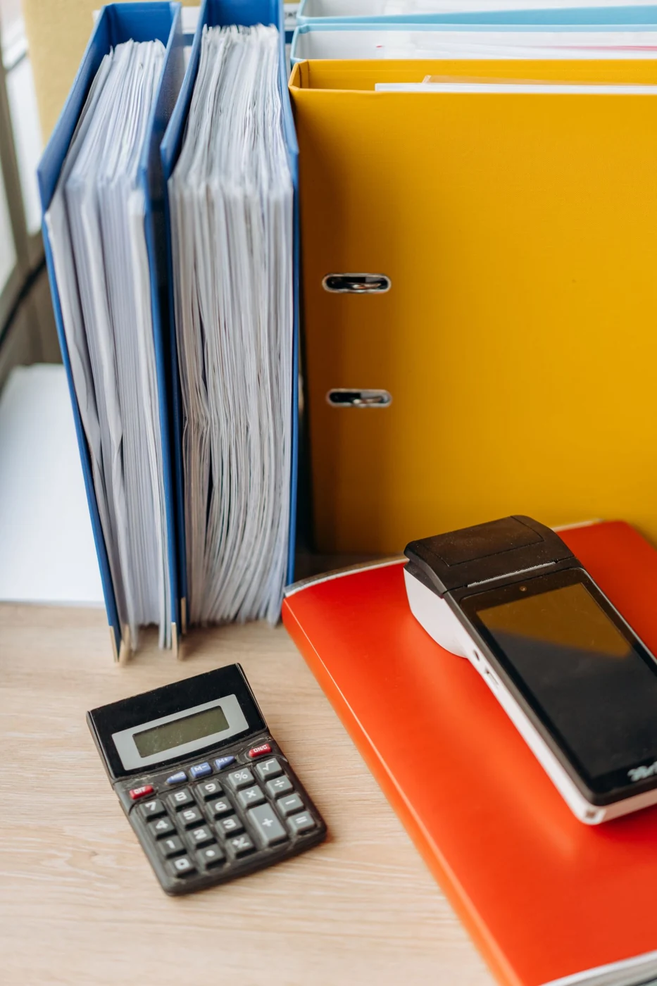 Calculator and business documents; illustrative stock photograph